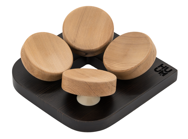 HUUM tASA black headrest with four rounded natural-wood support pads.