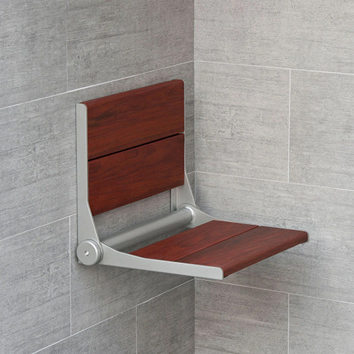 ThermaSol SEAT-S-GR bamboo shower seat installed and lowered against tiled shower walls