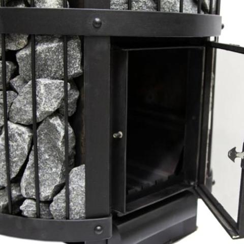 Close-up of an open firebox door on a Harvia Legend GreenFlame stove.