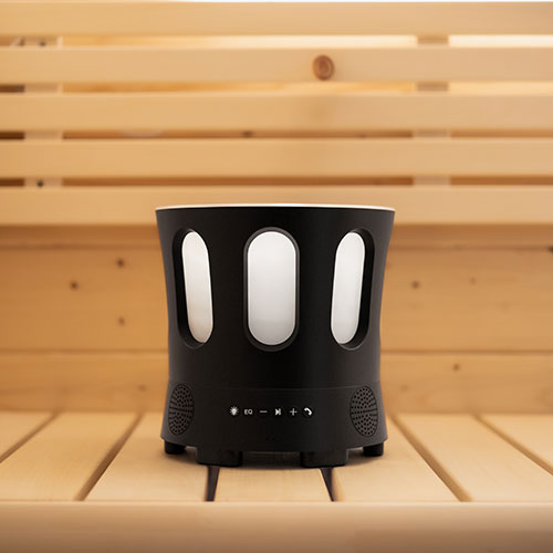 SaunaLife Zone - Bluetooth bucket on a wood sauna bench