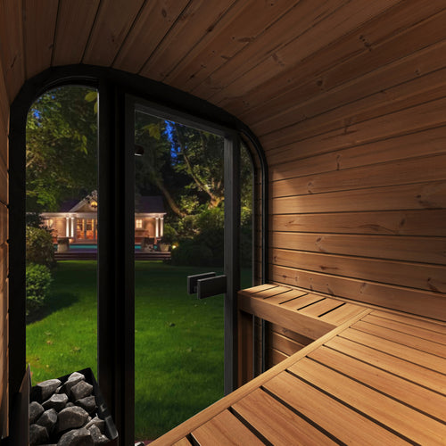 SaunaLife CL3GB compact cube sauna interior looking through glass door toward a garden.