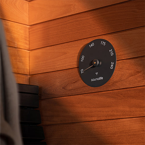 SaunaLife Designer Thermometer - black thermometer mounted on a wood wall