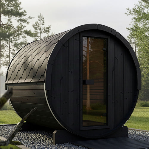 SaunaLife E8B black barrel sauna in a woodland garden.