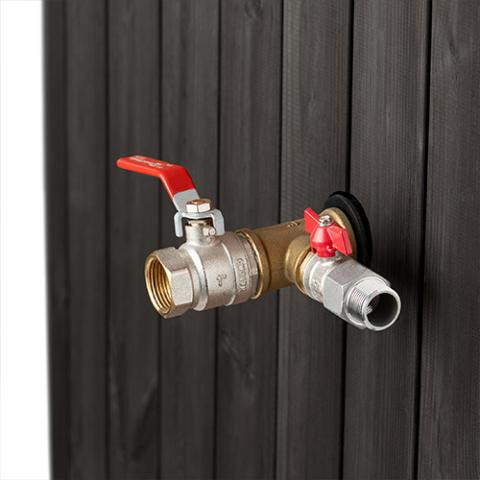 SaunaLife S1B immersion tub water connections and red-handled valves against black cladding.